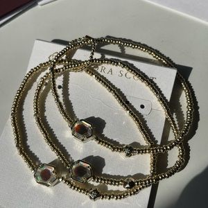 Dichroic Glass and Gold Tomon Stretch Bracelets